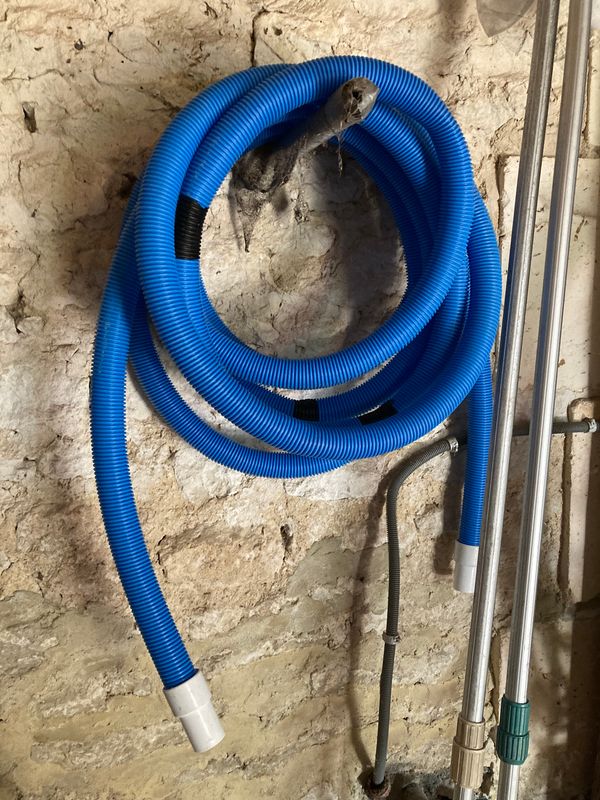 Pool vacuum blue pipe